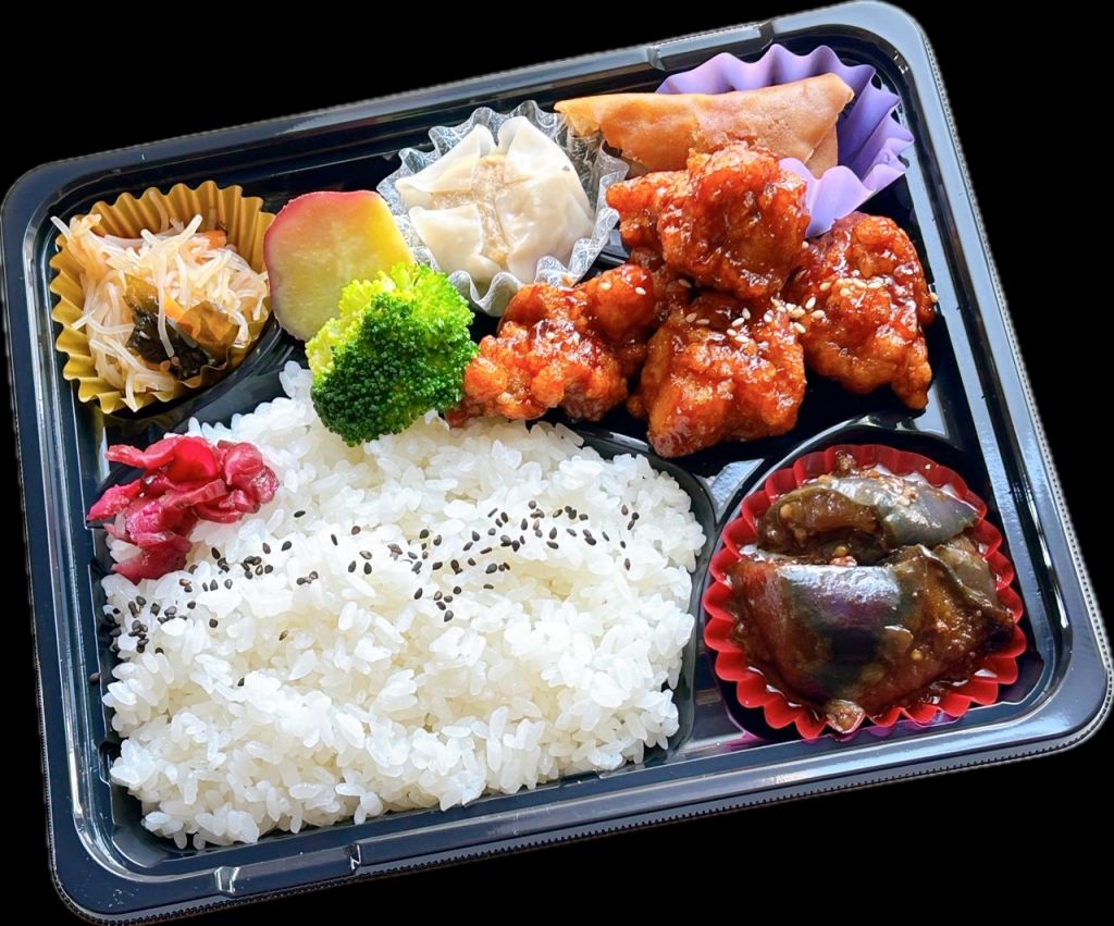 ヤンニョムチキン弁当（黒パック）777円