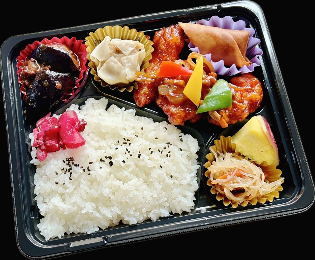 鶏の黒酢炒め弁当（黒パック）864円